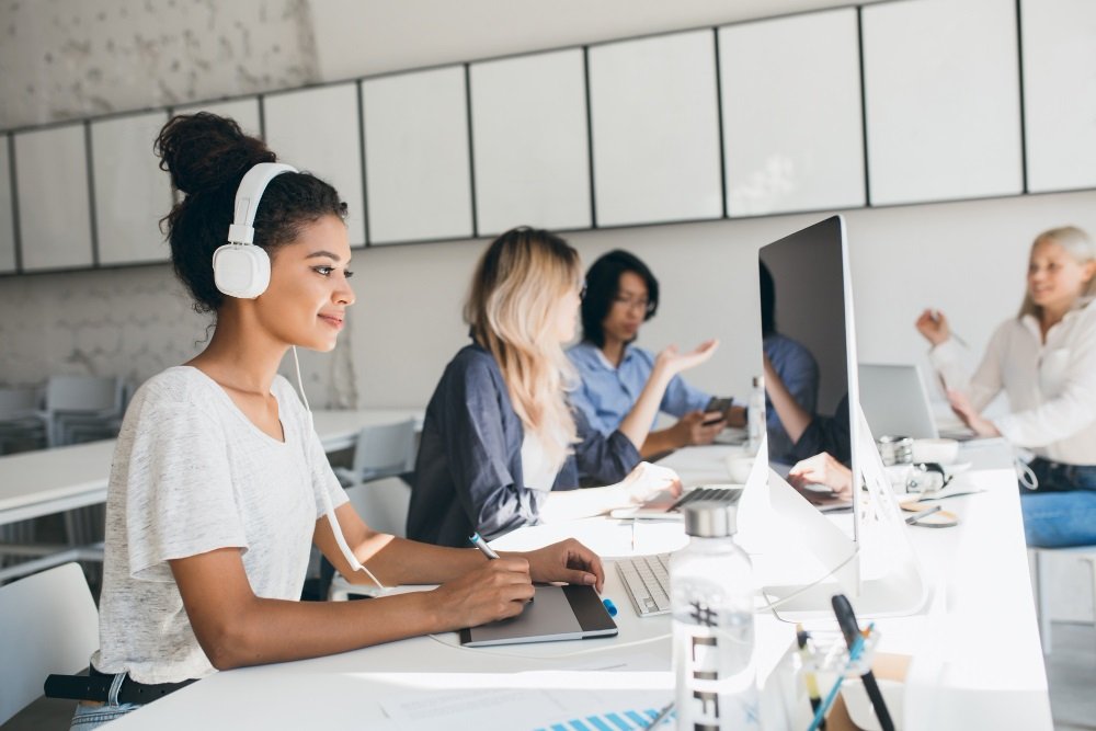 A workplace where people are happily working.